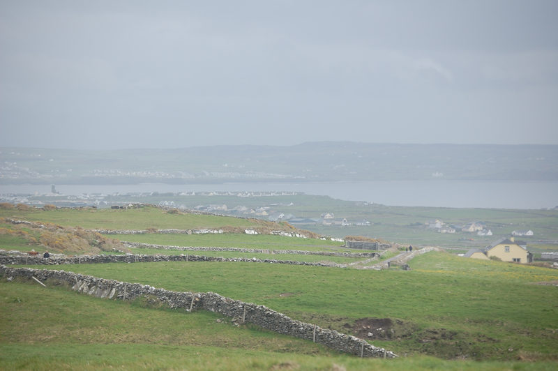 Stone walls running down to a bay you could only just make out.