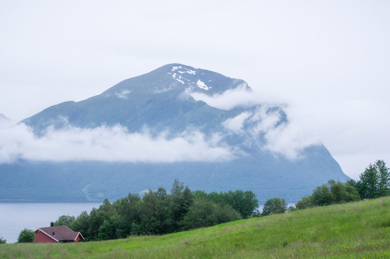 Cloud sitting on the hill above the last farm.